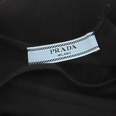 Pantalon en soie et plumes
