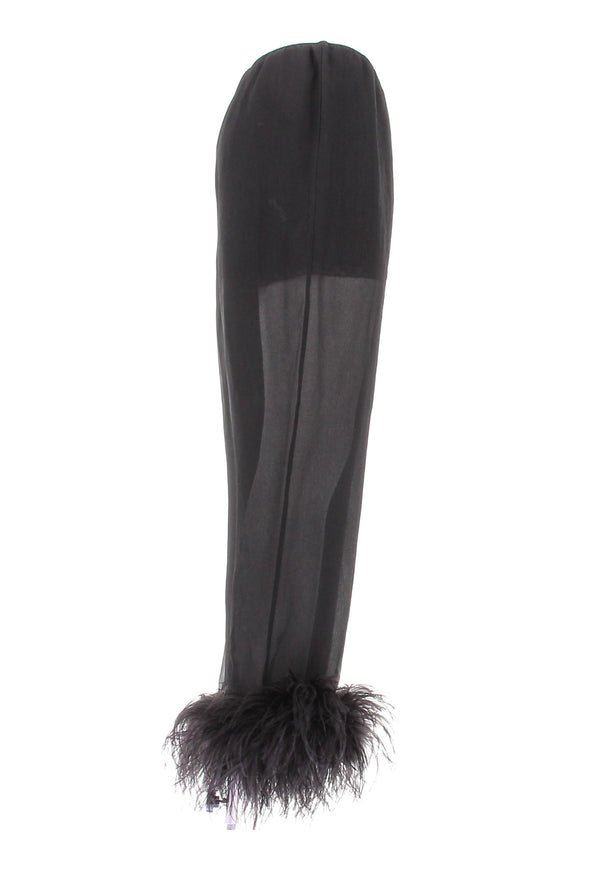 Pantalon en soie et plumes