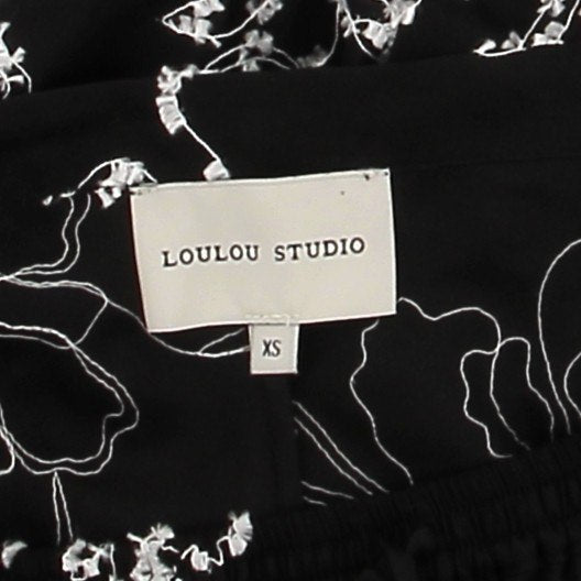 Pantalon "Markos" noir brodé en soie