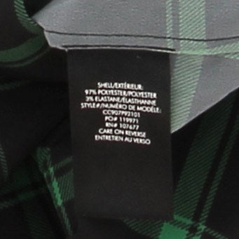 Pantalon à carreaux noirs et verts