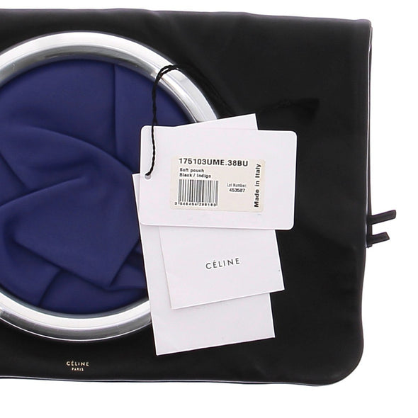 Pochette en cuir noir et cercle indigo