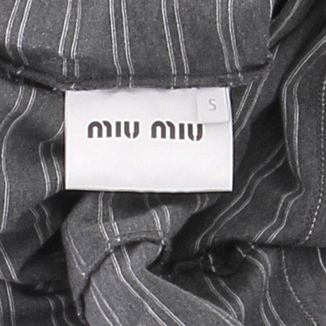 Polo oversize gris