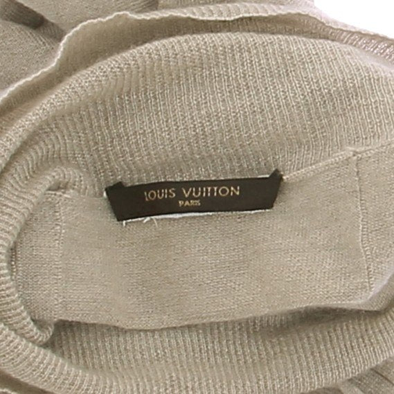Pull beige à chaines