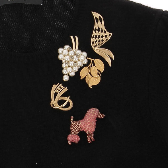 Pull à manches courtes avec broches