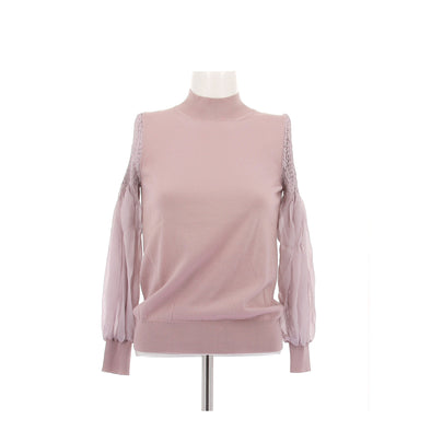 Pull rose à manches smockées