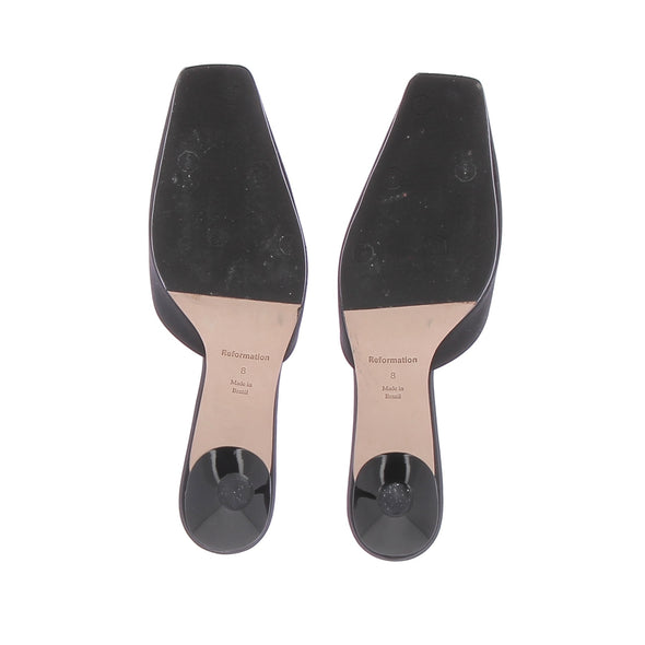 Mules à talons noires
