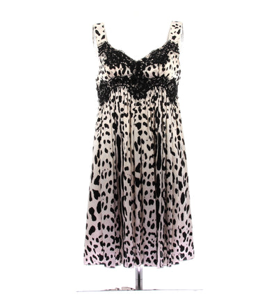 Robe en soie écrue et noire à motif animalier