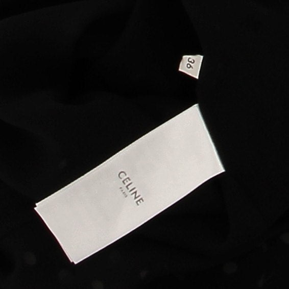 Robe noire à pois