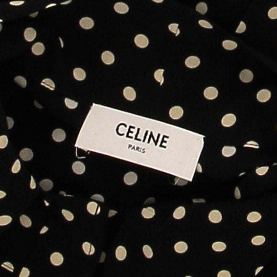 Robe noire à pois