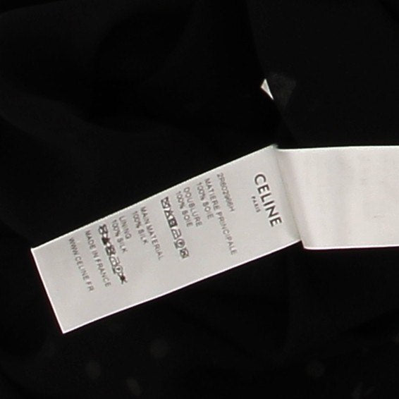 Robe noire à pois