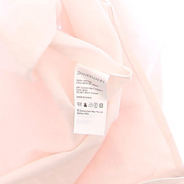 Robe rose à imprimé doré