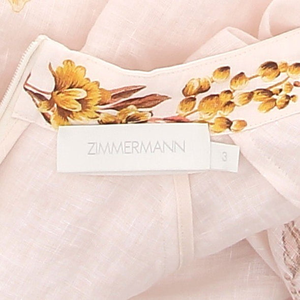 Robe rose à imprimé doré