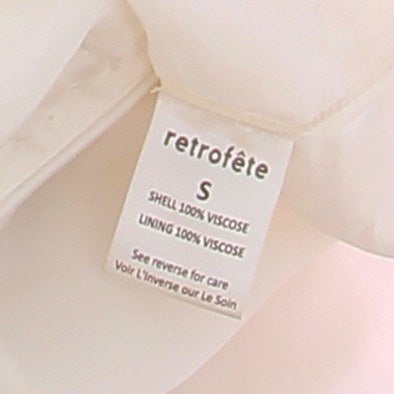Robe blanche à sequins argentés