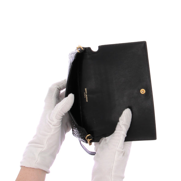 Pochette "Cassandre" en cuir embossé noir