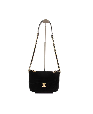 Sac à bandoulière en velours matelassé