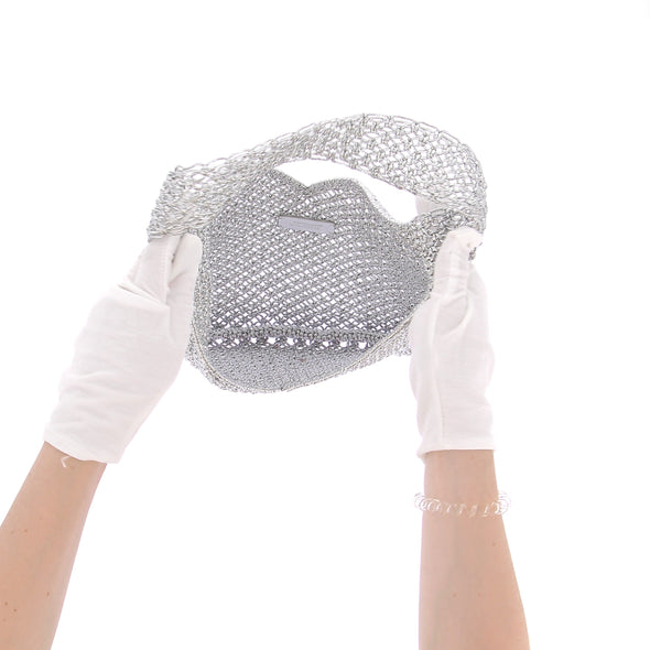 Sac à main métallique tissé argenté