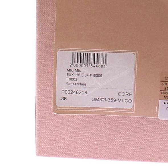 Sandales noires et perles