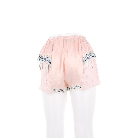 Short satiné rose avec pampilles