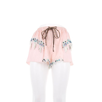 Short satiné rose avec pampilles