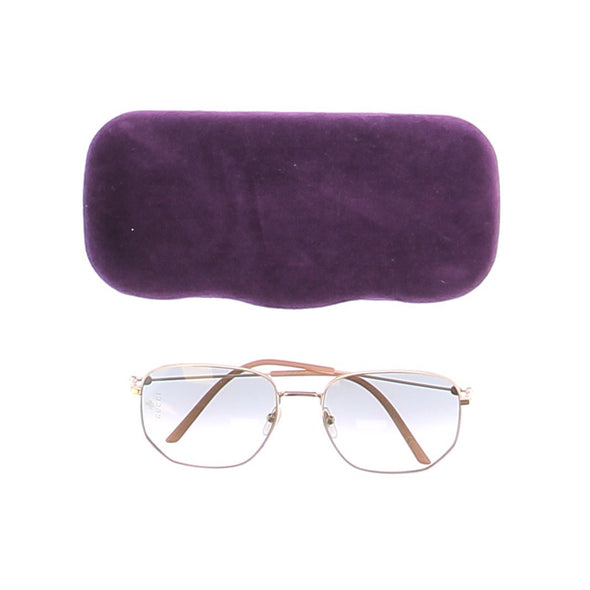 Lunettes de soleil dorées