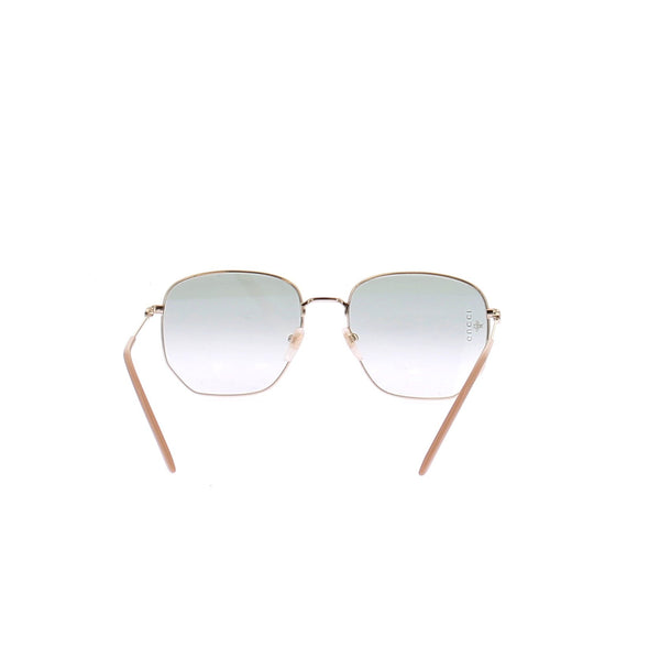 Lunettes de soleil dorées