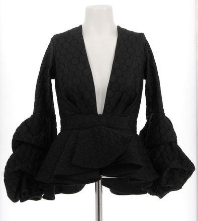 Top noir texturé à manches volumineuses