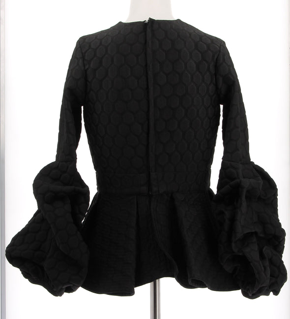 Top noir texturé à manches volumineuses