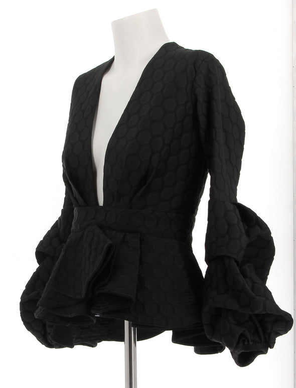 Top noir texturé à manches volumineuses