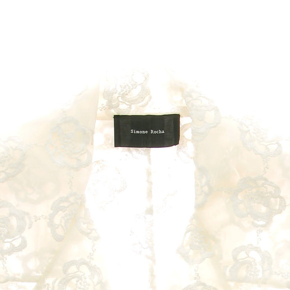 Veste en pvc brodé