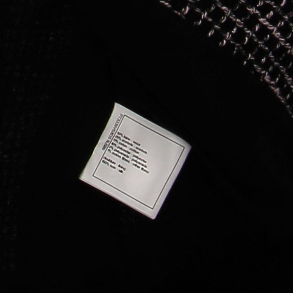 Veste en tweed rose et noire