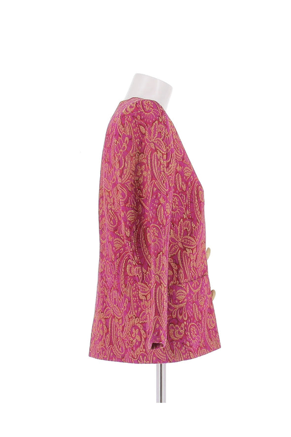 Veste rose et dorée