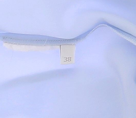 Blouse bleue à nœud