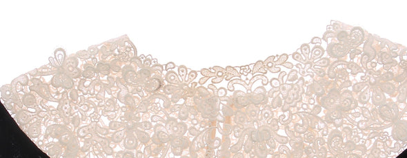 Top noir en dentelle blanche