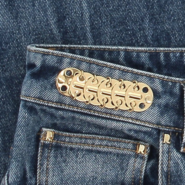 Jean en denim avec détails pastilles 69 dorées