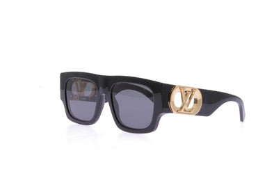 Lunettes de soleil noires à détails or