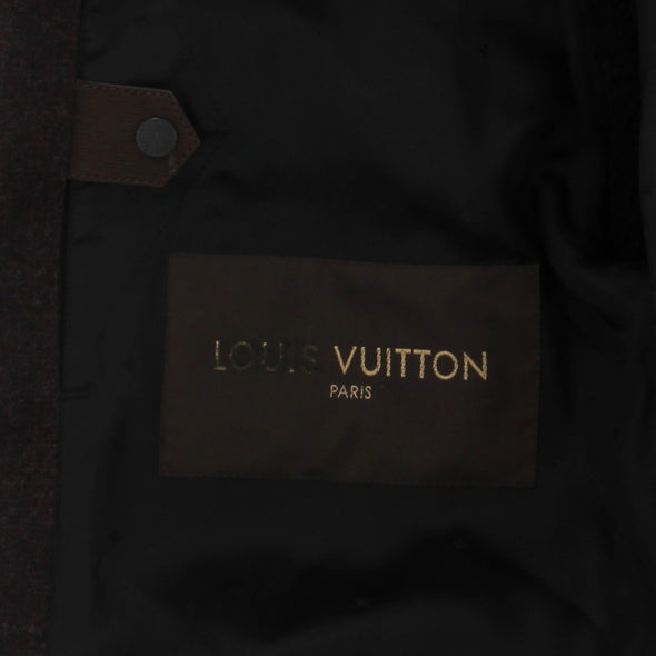 Manteau marron en cuir retourné et fourrure