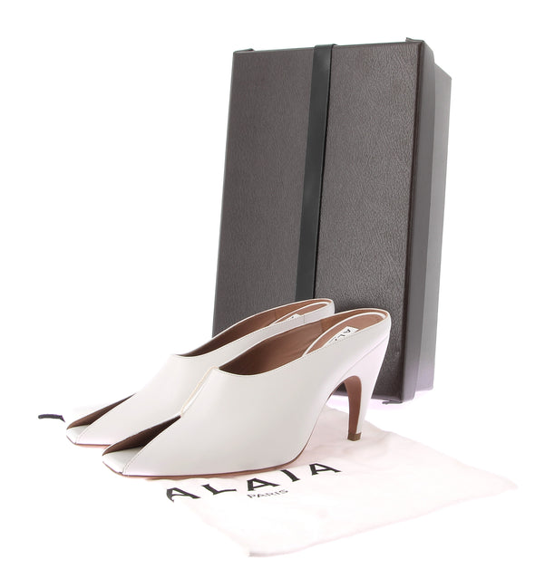 Mules en cuir blanc "Spike"