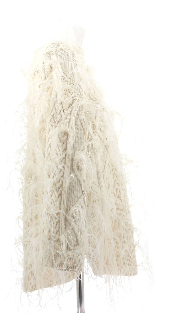 Pull en laine beige avec plumes