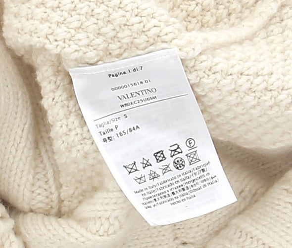 Pull en laine beige avec plumes