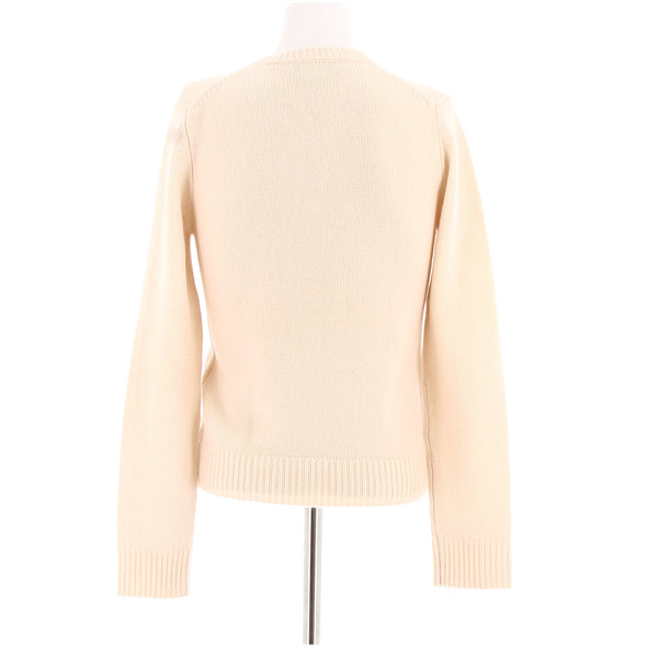 Pull crème à col V
