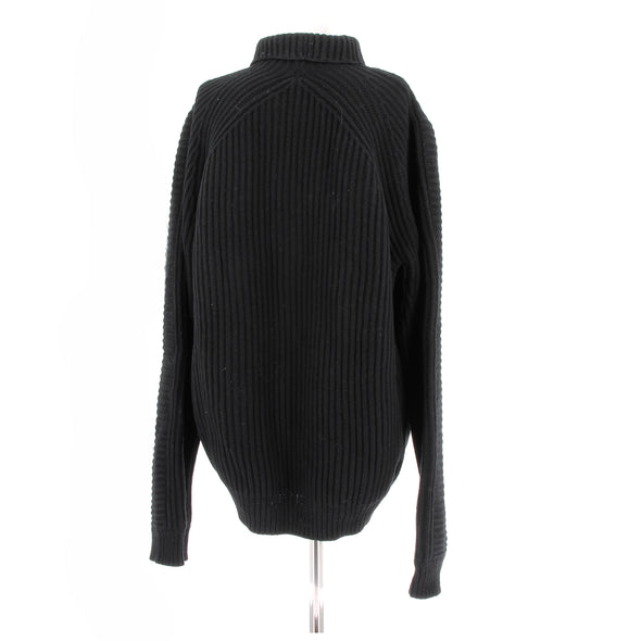 Pull noir col roulé