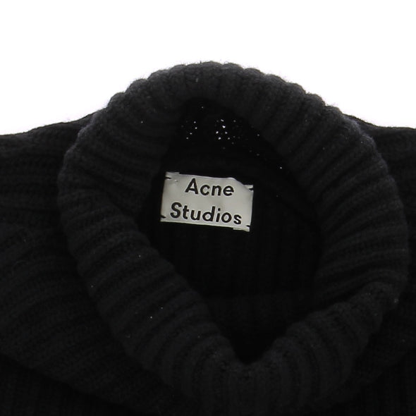 Pull noir col roulé