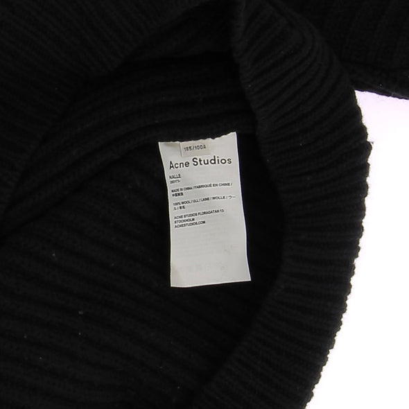 Pull noir col roulé