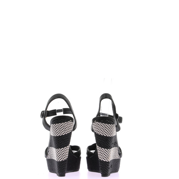 Sandales compensées noires et blanches