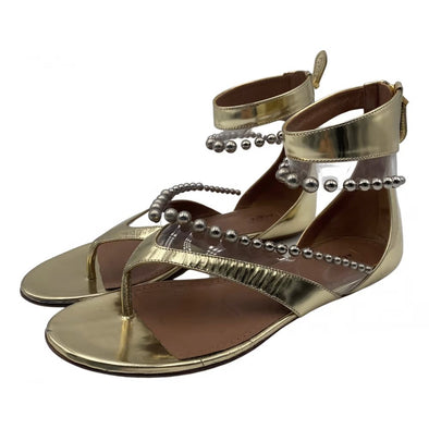 Sandales en cuir dorées - Alaïa